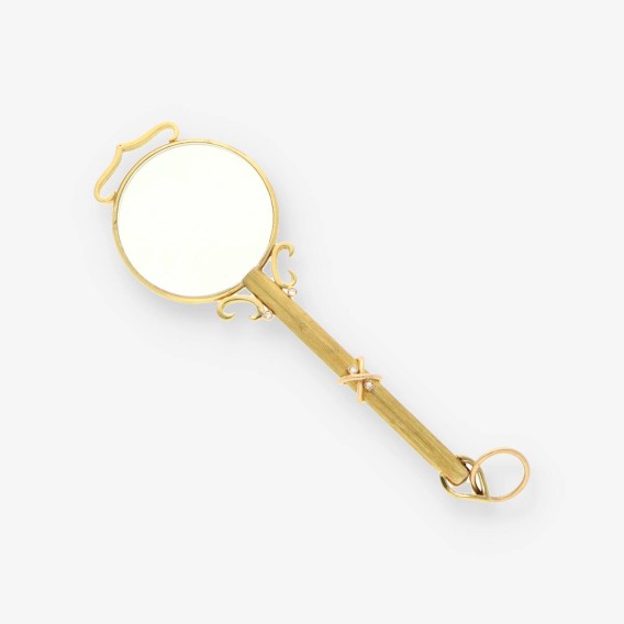 Colgante lupa oro y bri