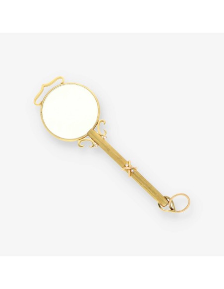 Colgante lupa oro y bri