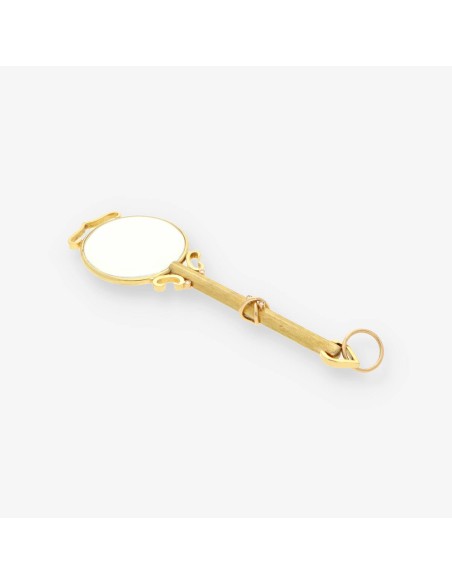 Colgante lupa oro y bri