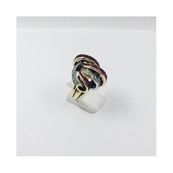 Anillo de oro blanco y amarillo, brillantes y rubÃ­es
