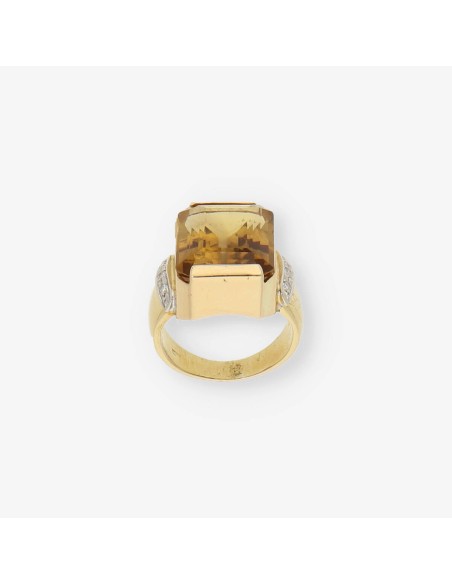 Anillo de oro 18kt con topacio y brillantes