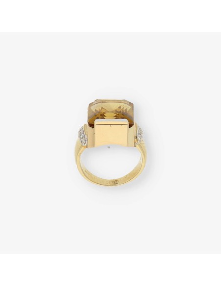 Anillo de oro 18kt con topacio y brillantes
