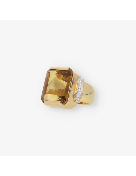 Anillo de oro 18kt con topacio y brillantes