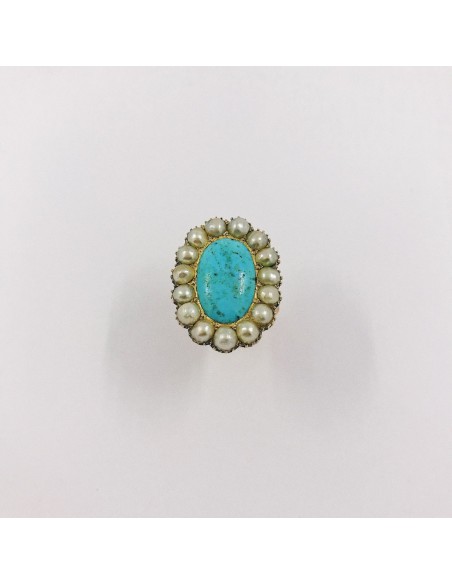 Anillo en oro 18kt con turquesa central y perlas
