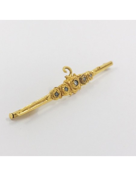 Broche aguja en oro y diamantes