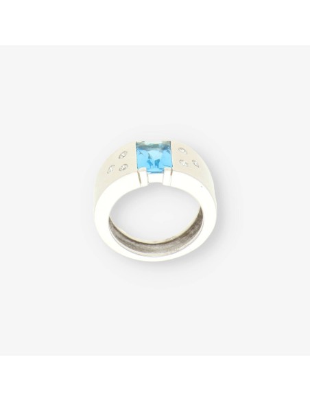 Anillo oro blanco piedra azul y bri