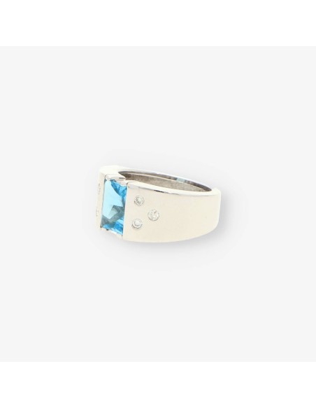 Anillo oro blanco piedra azul y bri