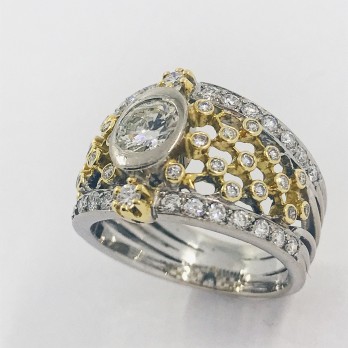 Anillo en oro blanco y amarillo con brillantes. 2
