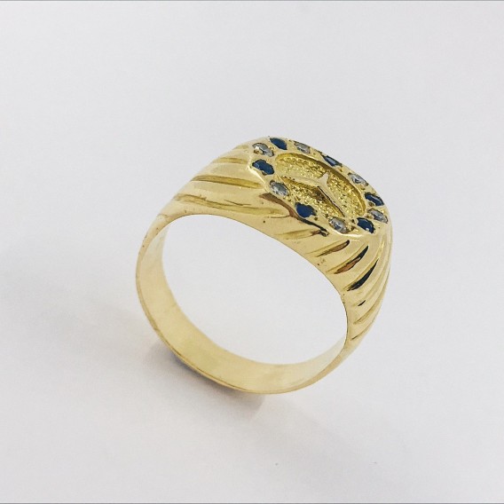 Sello con el sÃ­mbolo de Mercedes-Benz en oro 18kt