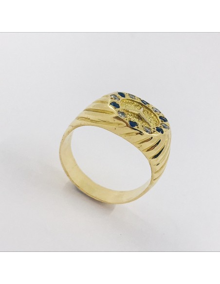 Sello con el sÃ­mbolo de Mercedes-Benz en oro 18kt