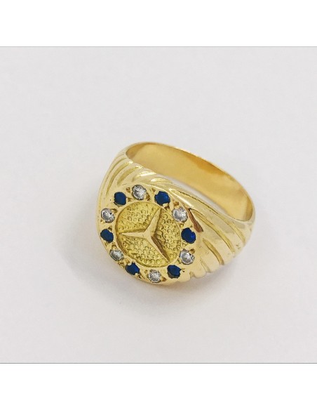 Sello con el sÃ­mbolo de Mercedes-Benz en oro 18kt