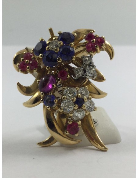 Broche de oro con brillantes y piedras de color