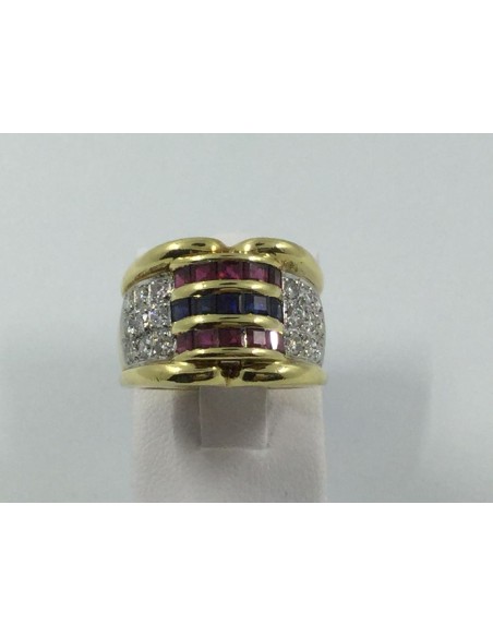Anillo en oro con brillantes, zafiros y rubÃ­es