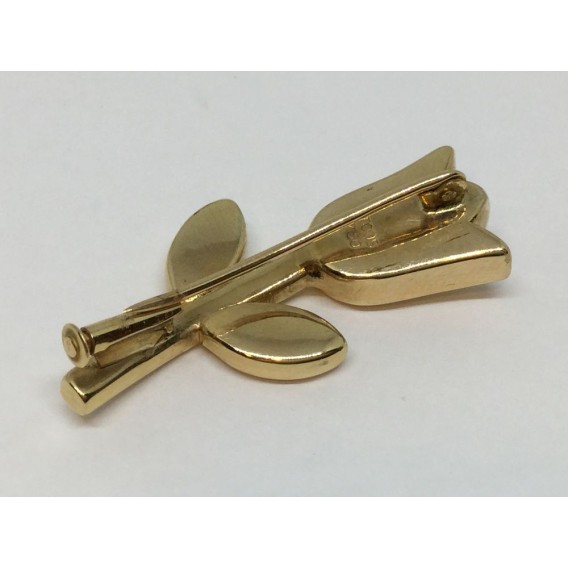 Aguja Tous de oro en forma de flor