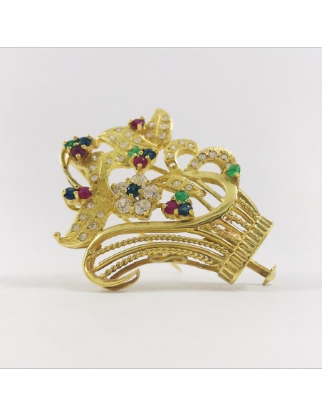 Broche en oro, circonitas y piedras de color