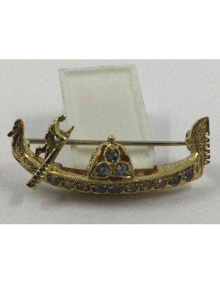 Broche en oro con piedras de color