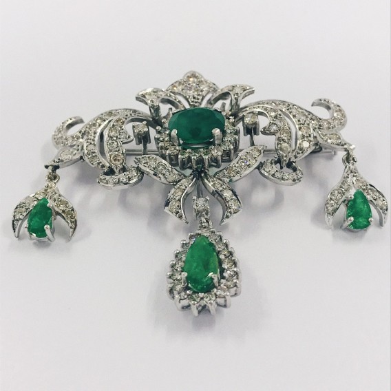 Broche en oro blanco 18kt brillante y esmeralda
