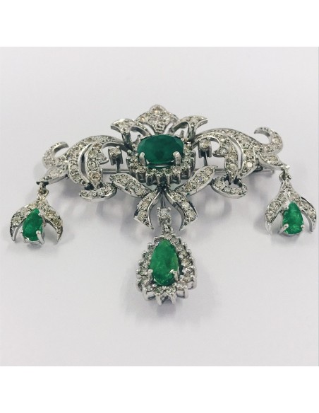 Broche en oro blanco 18kt brillante y esmeralda