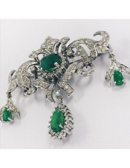 Broche en oro blanco 18kt brillante y esmeralda