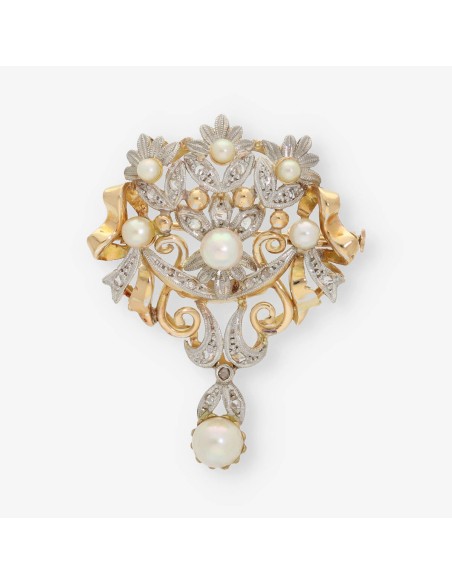 Broche de oro con diamantes y perlas