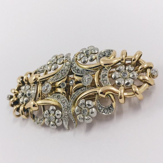 Broche vintage en oro bicolor 18kt con brillantes