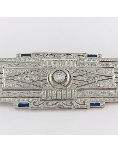 Broche Art Deco en oro blanco 18kt y brillantes.