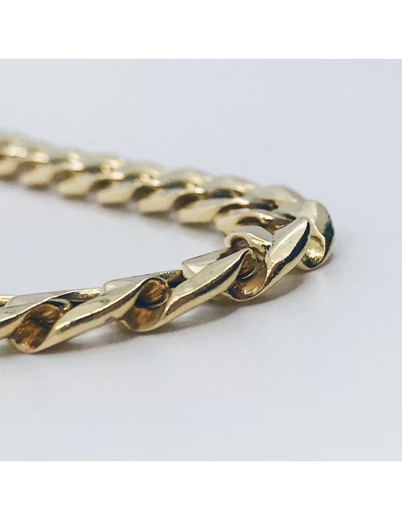 Cadena barbada plana en oro 18kt