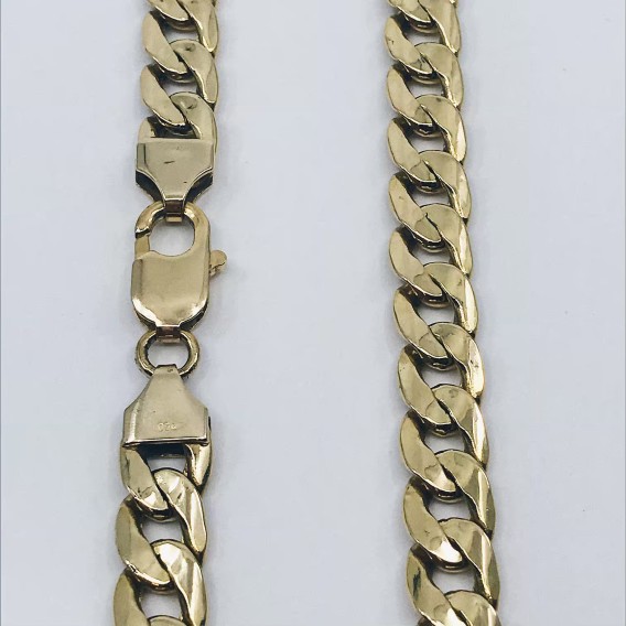 Cadena barbada plana en oro 18kt