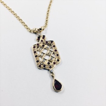 Colgante en oro con brillantes y rubÃ­es