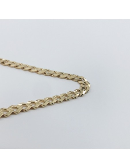 Cadena barbada plana en oro 18kt