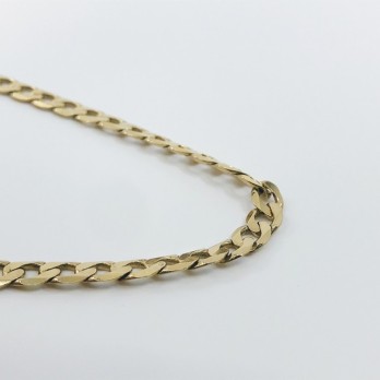 Cadena barbada plana en oro 18kt 2