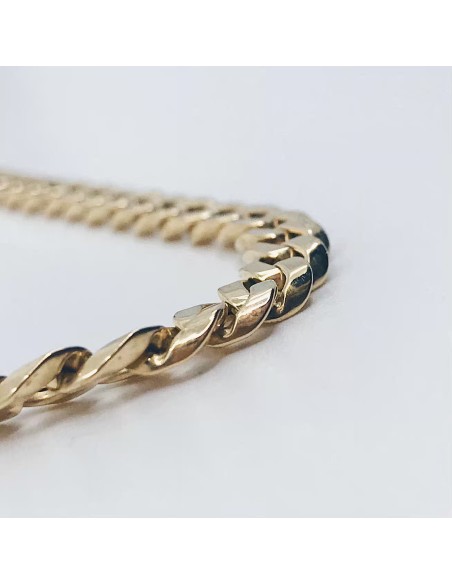 Cadena barbada plana en oro 18kt