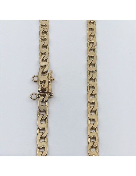 Cadena barbada plana en oro 18kt