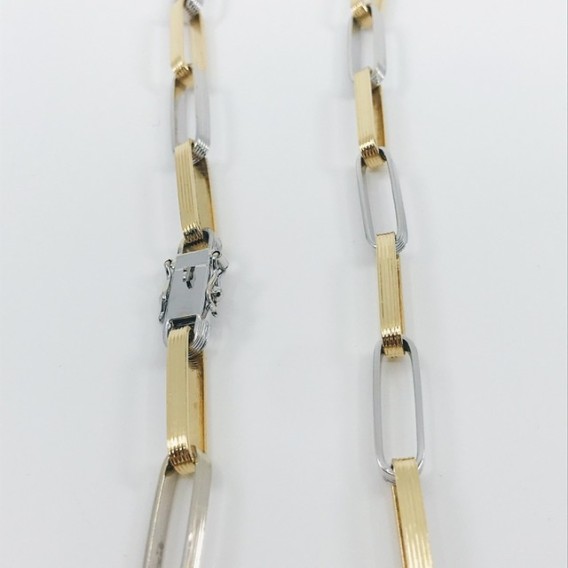 Cadena forzada con eslabones largos en oro bicolor 18kt