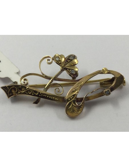 Broche en oro con diamantes