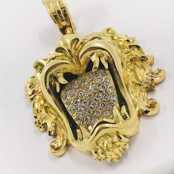 Cabeza LeÃ³n en oro 18kt