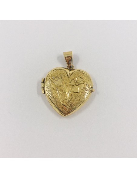 Colgante de oro 18kt en forma de corazÃ³n.
