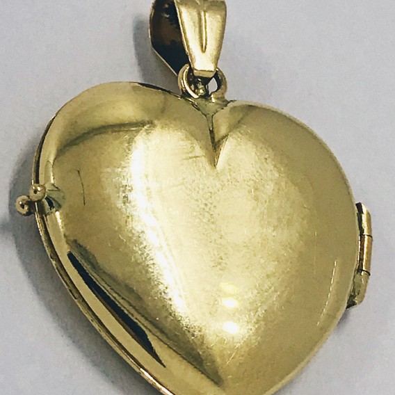 Colgante de oro 18kt en forma de corazÃ³n.