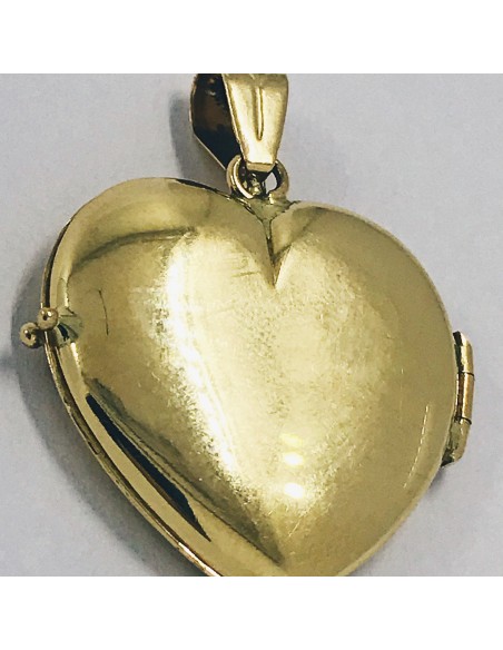 Colgante de oro 18kt en forma de corazÃ³n.