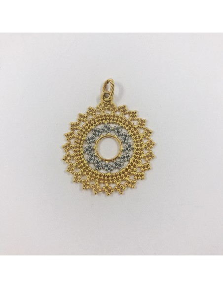 Colgante sol en oro blanco y amarillo.