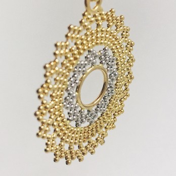 Colgante sol en oro blanco y amarillo. 2