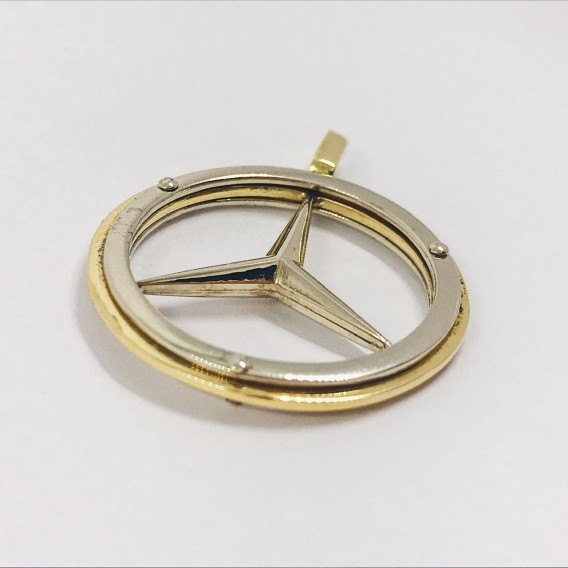Colgante oro bicolor con el sÃ­mbolo de Mercedes-Benz