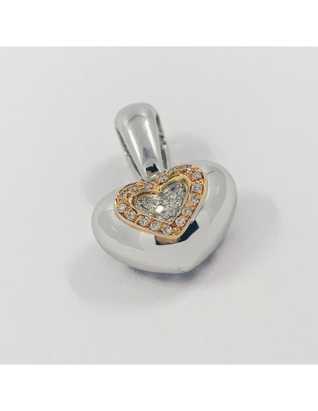 Colgante Chimento corazÃ³n en oro blanco con brillantes.