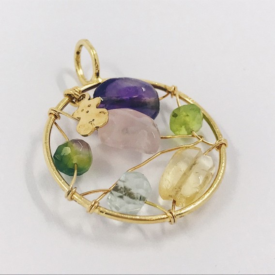 Colgante tous en oro 18kt.