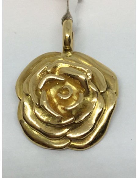 Colgante Tous de oro en forma de flor.