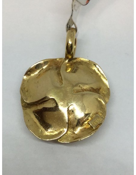 Colgante Tous de oro en forma de flor.