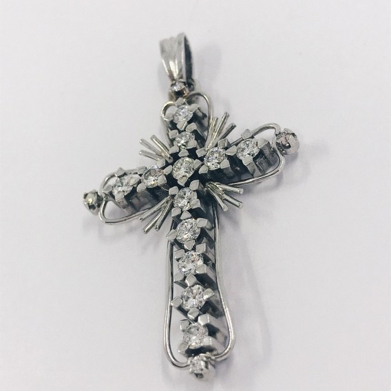 Colgante cruz en oro blanco 18kt. y brillantes.