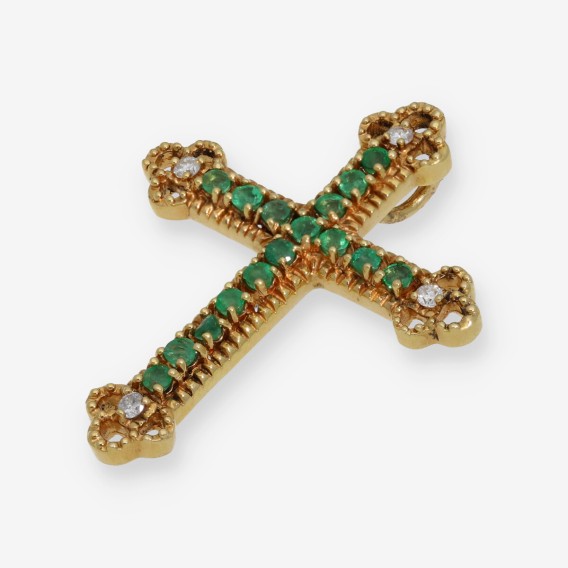 Cruz en oro 18kt con brillantes y esmeraldas