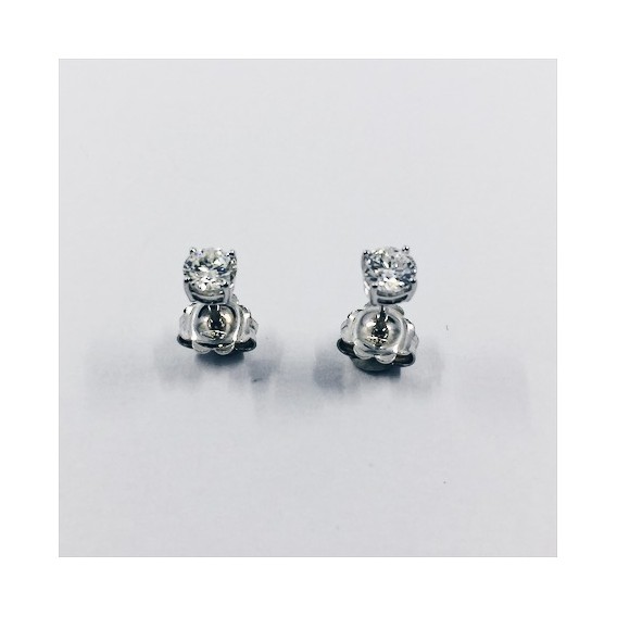 Pendientes dormilonas en oro blanco y brillantes