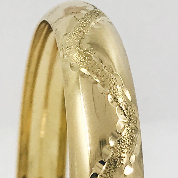 Esclava circular en oro 18kt.